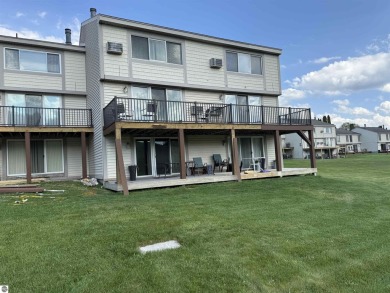 Welcome to your slice of Leelanau County. Tucked into the heart on Manitou Passage Golf Club in Michigan - for sale on GolfHomes.com, golf home, golf lot