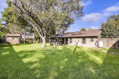 This 3-bedroom, 2-bathroom home is nestled in the highly coveted on Pecan Plantation Country Club in Texas - for sale on GolfHomes.com, golf home, golf lot