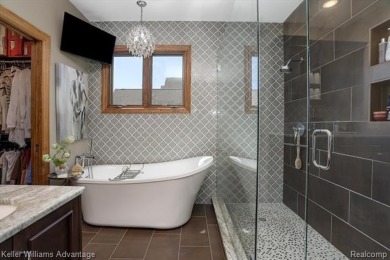 Welcome to 23790 Point O Woods Court, a beautifully designed on River Bank Golf Course in Michigan - for sale on GolfHomes.com, golf home, golf lot