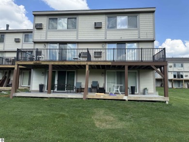 Welcome to your slice of Leelanau County. Tucked into the heart on Manitou Passage Golf Club in Michigan - for sale on GolfHomes.com, golf home, golf lot