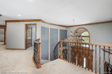 Welcome to 23790 Point O Woods Court, a beautifully designed on River Bank Golf Course in Michigan - for sale on GolfHomes.com, golf home, golf lot