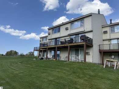 Welcome to your slice of Leelanau County. Tucked into the heart on Manitou Passage Golf Club in Michigan - for sale on GolfHomes.com, golf home, golf lot