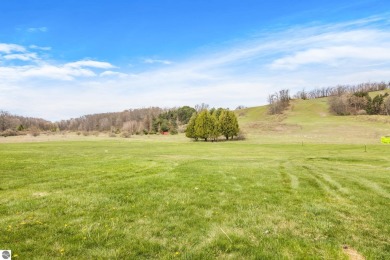 Welcome to your slice of Leelanau County. Tucked into the heart on Manitou Passage Golf Club in Michigan - for sale on GolfHomes.com, golf home, golf lot