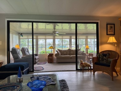 This lovely, manufacture home is on leased land in Lake Fairways on Pine Lakes Country Club in Florida - for sale on GolfHomes.com, golf home, golf lot