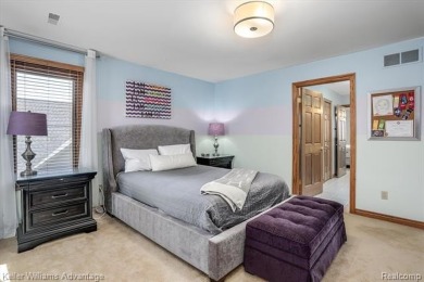 Welcome to 23790 Point O Woods Court, a beautifully designed on River Bank Golf Course in Michigan - for sale on GolfHomes.com, golf home, golf lot
