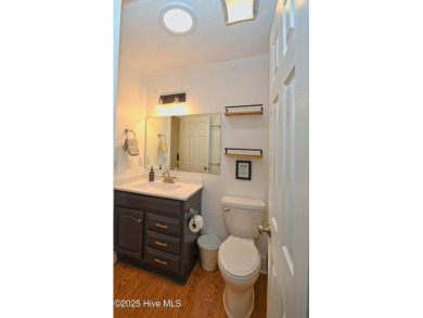 The perfect !  This sweet home has been lovingly renovated as a on Sea Trail Golf Resort in North Carolina - for sale on GolfHomes.com, golf home, golf lot