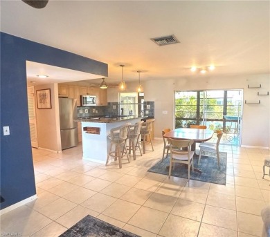 This 2 bedroom, 2 bathroom villa w/garage features an updated on The Glades Golf and Country Club in Florida - for sale on GolfHomes.com, golf home, golf lot