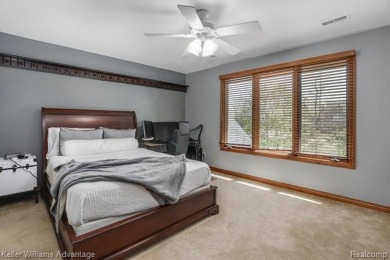 Welcome to 23790 Point O Woods Court, a beautifully designed on River Bank Golf Course in Michigan - for sale on GolfHomes.com, golf home, golf lot
