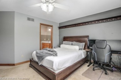 Welcome to 23790 Point O Woods Court, a beautifully designed on River Bank Golf Course in Michigan - for sale on GolfHomes.com, golf home, golf lot