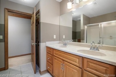 Welcome to 23790 Point O Woods Court, a beautifully designed on River Bank Golf Course in Michigan - for sale on GolfHomes.com, golf home, golf lot