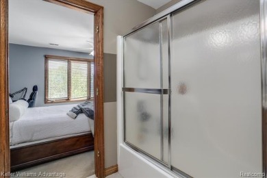 Welcome to 23790 Point O Woods Court, a beautifully designed on River Bank Golf Course in Michigan - for sale on GolfHomes.com, golf home, golf lot