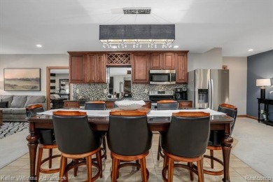 Welcome to 23790 Point O Woods Court, a beautifully designed on River Bank Golf Course in Michigan - for sale on GolfHomes.com, golf home, golf lot