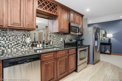 Welcome to 23790 Point O Woods Court, a beautifully designed on River Bank Golf Course in Michigan - for sale on GolfHomes.com, golf home, golf lot