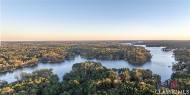 Relax and gaze upon the peaceful water view of this interior on Harbor Club Golf and Country Club in Georgia - for sale on GolfHomes.com, golf home, golf lot