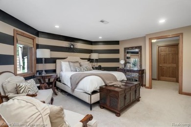 Welcome to 23790 Point O Woods Court, a beautifully designed on River Bank Golf Course in Michigan - for sale on GolfHomes.com, golf home, golf lot