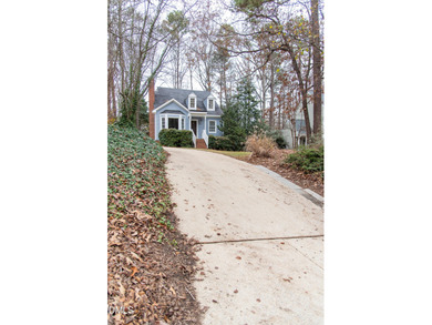 Nestled in the desirable Hedingham subdivision, this 3-bedroom on Hedingham Golf and Athletic Club in North Carolina - for sale on GolfHomes.com, golf home, golf lot