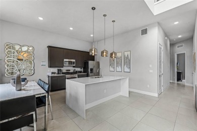 Experience the epitome of luxury resort living in this stunning on Reunion Resort Golf Course in Florida - for sale on GolfHomes.com, golf home, golf lot