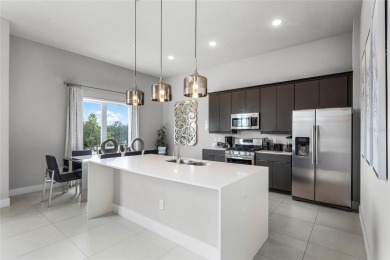 Experience the epitome of luxury resort living in this stunning on Reunion Resort Golf Course in Florida - for sale on GolfHomes.com, golf home, golf lot