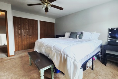 This beautifully maintained 4-bedroom, 2-bath tri-level home is on Lakes of the Four Seasons Country Club in Indiana - for sale on GolfHomes.com, golf home, golf lot