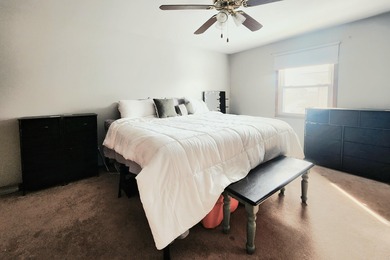 This beautifully maintained 4-bedroom, 2-bath tri-level home is on Lakes of the Four Seasons Country Club in Indiana - for sale on GolfHomes.com, golf home, golf lot