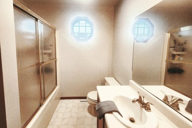 This beautifully maintained 4-bedroom, 2-bath tri-level home is on Lakes of the Four Seasons Country Club in Indiana - for sale on GolfHomes.com, golf home, golf lot