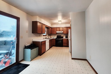 This beautifully maintained 4-bedroom, 2-bath tri-level home is on Lakes of the Four Seasons Country Club in Indiana - for sale on GolfHomes.com, golf home, golf lot