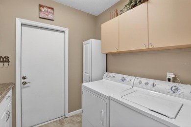 One or more photo(s) has been virtually staged. Located in the on The Golf Club of Cypress Creek in Florida - for sale on GolfHomes.com, golf home, golf lot