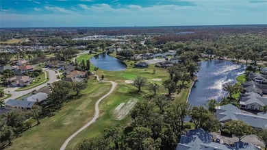 One or more photo(s) has been virtually staged. Located in the on The Golf Club of Cypress Creek in Florida - for sale on GolfHomes.com, golf home, golf lot