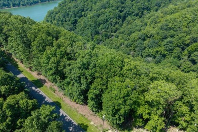 Discover 2.05 wooded acres in DeKalb County, TN, nestled in the on Riverwatch Golf Club in Tennessee - for sale on GolfHomes.com, golf home, golf lot