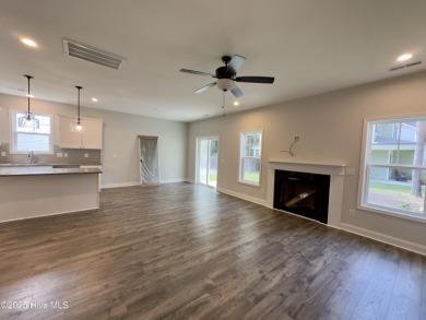 Welcome to your dream home! This stunning 2,352 square foot on Woodlake Country Club in North Carolina - for sale on GolfHomes.com, golf home, golf lot