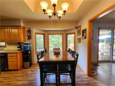 Welcome to this inviting Bella Vista corner-lot home designed on Bella Vista - Metfield Golf Complex and Country Club in Arkansas - for sale on GolfHomes.com, golf home, golf lot
