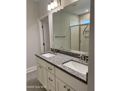 Welcome to your dream home! This stunning 2,352 square foot on Woodlake Country Club in North Carolina - for sale on GolfHomes.com, golf home, golf lot