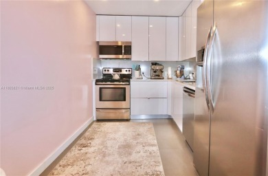 STUNNINGLY RENOVATED MODERN 2B/R 2B/A WITH DIRECT GOLF COURSE & on Turnberry Isle Resort and Club in Florida - for sale on GolfHomes.com, golf home, golf lot