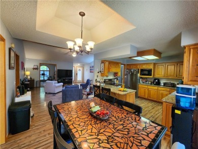 Welcome to this inviting Bella Vista corner-lot home designed on Bella Vista - Metfield Golf Complex and Country Club in Arkansas - for sale on GolfHomes.com, golf home, golf lot