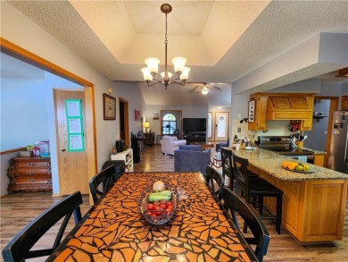 Welcome to this inviting Bella Vista corner-lot home designed on Bella Vista - Metfield Golf Complex and Country Club in Arkansas - for sale on GolfHomes.com, golf home, golf lot