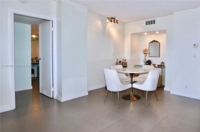 STUNNINGLY RENOVATED MODERN 2B/R 2B/A WITH DIRECT GOLF COURSE & on Turnberry Isle Resort and Club in Florida - for sale on GolfHomes.com, golf home, golf lot
