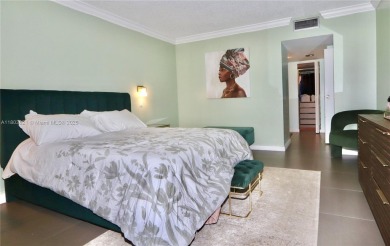 STUNNINGLY RENOVATED MODERN 2B/R 2B/A WITH DIRECT GOLF COURSE & on Turnberry Isle Resort and Club in Florida - for sale on GolfHomes.com, golf home, golf lot