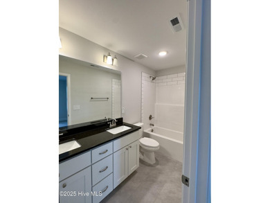 Welcome to your dream home! This stunning 2,352 square foot on Woodlake Country Club in North Carolina - for sale on GolfHomes.com, golf home, golf lot