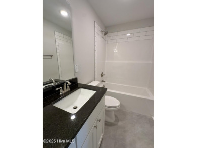 Welcome to your dream home! This stunning 2,352 square foot on Woodlake Country Club in North Carolina - for sale on GolfHomes.com, golf home, golf lot