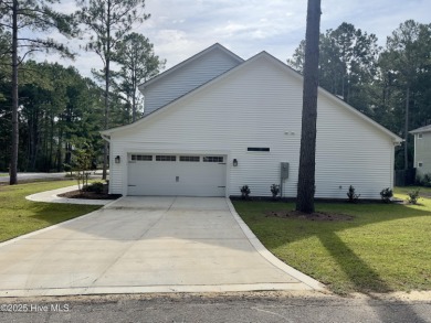 Welcome to your dream home! This stunning 2,352 square foot on Woodlake Country Club in North Carolina - for sale on GolfHomes.com, golf home, golf lot