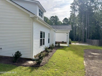 Welcome to your dream home! This stunning 2,352 square foot on Woodlake Country Club in North Carolina - for sale on GolfHomes.com, golf home, golf lot