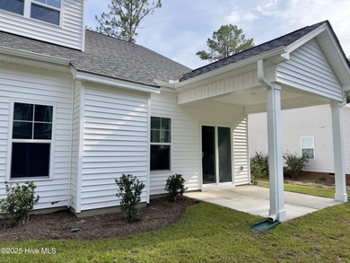 Welcome to your dream home! This stunning 2,352 square foot on Woodlake Country Club in North Carolina - for sale on GolfHomes.com, golf home, golf lot