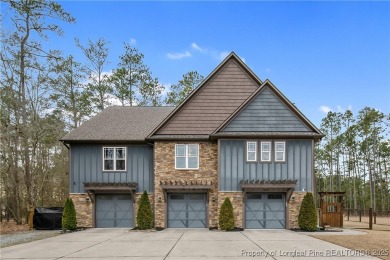 This stunning mountain farmhouse blends rustic charm with modern on Upland Trace Golf Course in North Carolina - for sale on GolfHomes.com, golf home, golf lot