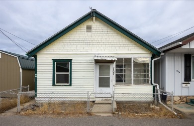 Built in 1906, this charming turn of the century home on E Front on The Old Works Golf Course in Montana - for sale on GolfHomes.com, golf home, golf lot