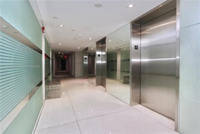 STUNNINGLY RENOVATED MODERN 2B/R 2B/A WITH DIRECT GOLF COURSE & on Turnberry Isle Resort and Club in Florida - for sale on GolfHomes.com, golf home, golf lot