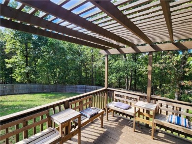 Welcome to this inviting Bella Vista corner-lot home designed on Bella Vista - Metfield Golf Complex and Country Club in Arkansas - for sale on GolfHomes.com, golf home, golf lot