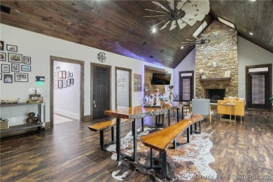 This stunning mountain farmhouse blends rustic charm with modern on Upland Trace Golf Course in North Carolina - for sale on GolfHomes.com, golf home, golf lot