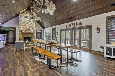 This stunning mountain farmhouse blends rustic charm with modern on Upland Trace Golf Course in North Carolina - for sale on GolfHomes.com, golf home, golf lot