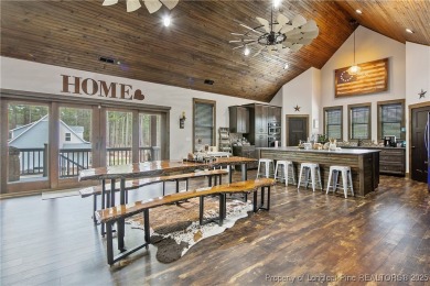 This stunning mountain farmhouse blends rustic charm with modern on Upland Trace Golf Course in North Carolina - for sale on GolfHomes.com, golf home, golf lot