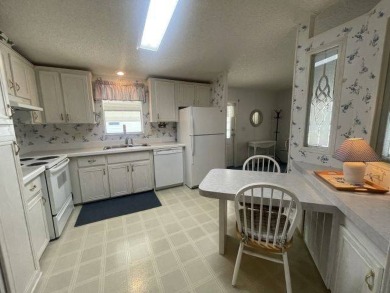 NEW REDUCED PRICE ~ $89,900! Located adjacent to a Florida on Four Lakes Golf Club in Florida - for sale on GolfHomes.com, golf home, golf lot